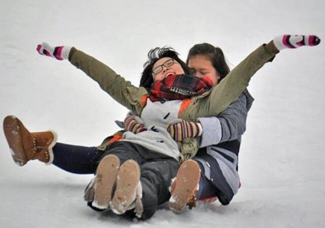 Students sledding