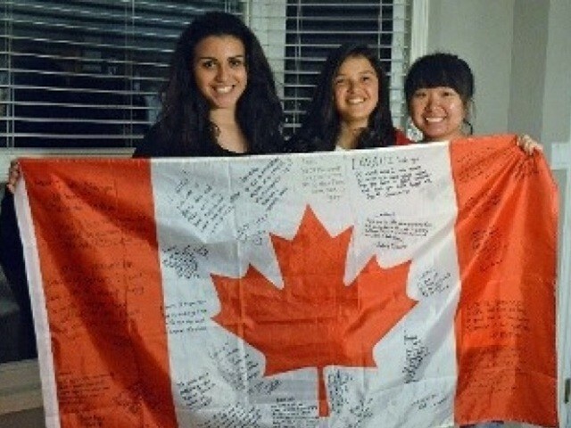 Students with Canadian flag